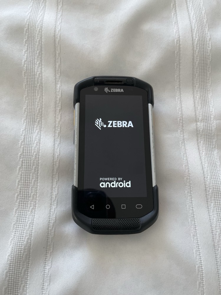 Two Zebra TC720L Scanners, Walmart Software. No batteries.