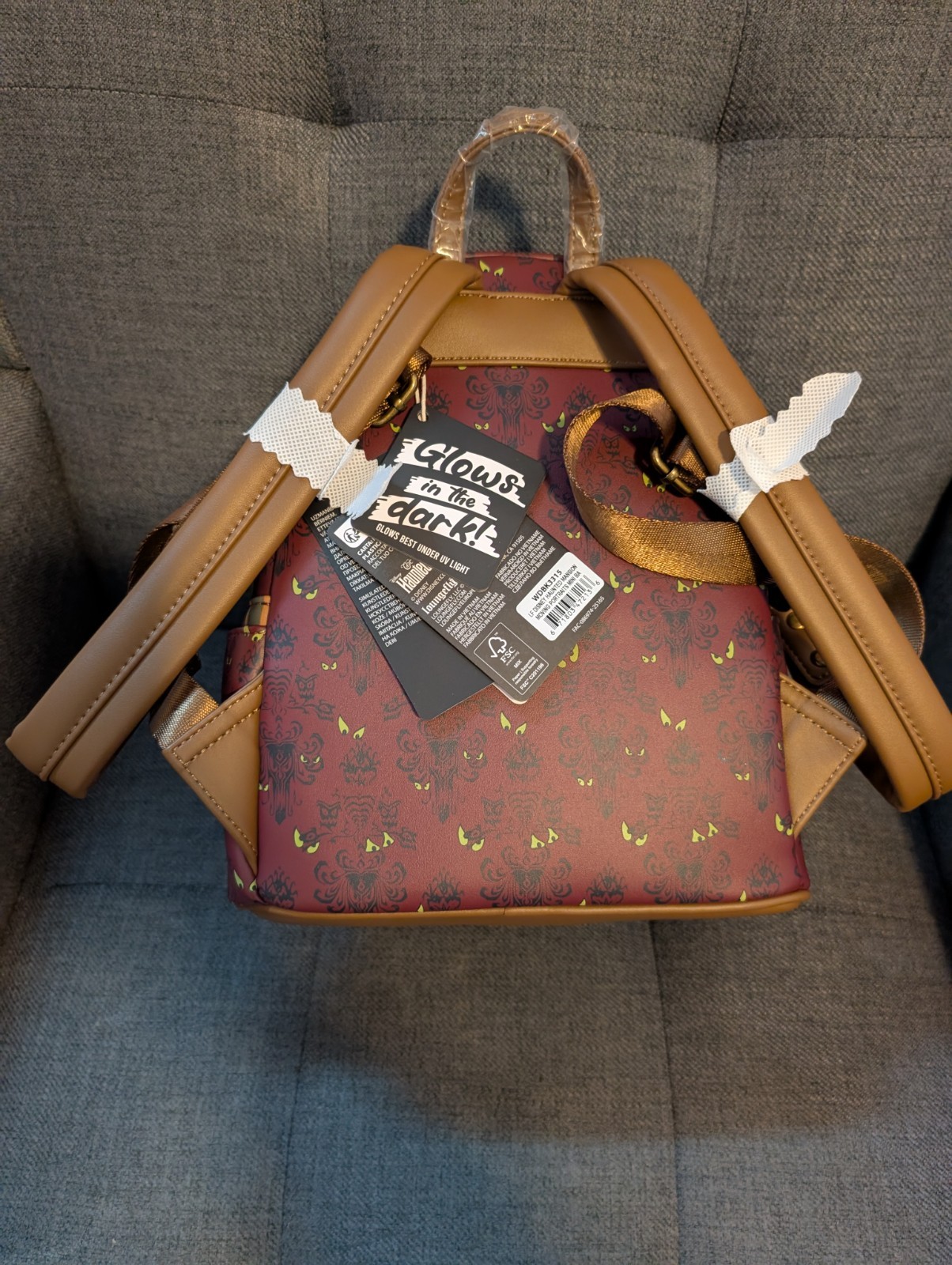 Disney Haunted Mansion Stretching Room Portraits Glow-in-the-Dark Mini Backpack