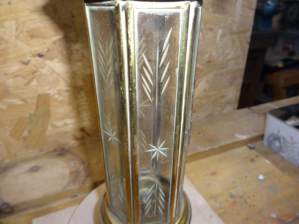 A Brass Candle Lamp.