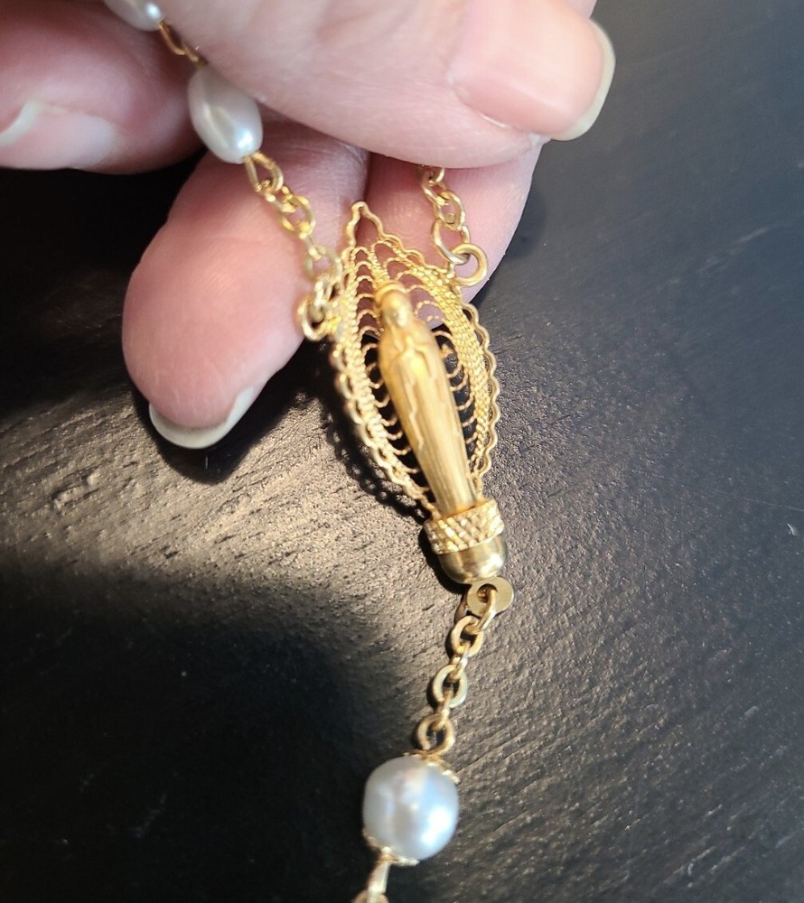 Cross, necklace and rosary