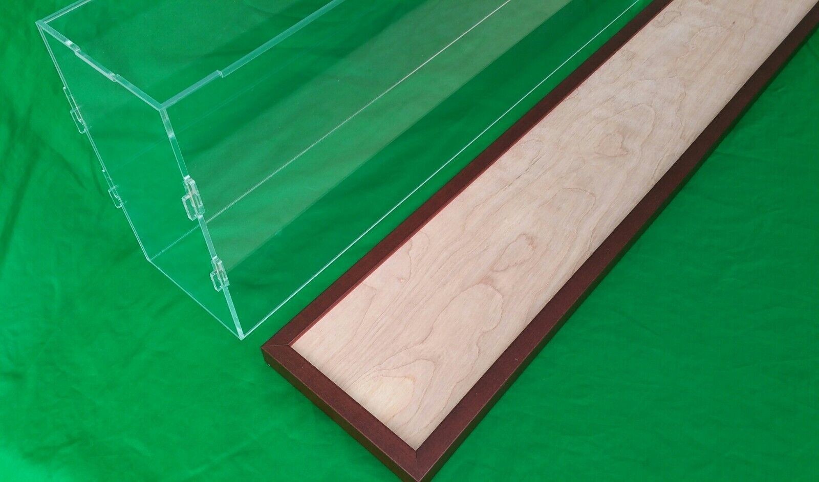 29"L x 11"W x 7"H display case with 3/16" thick acrylic brown wood frame base