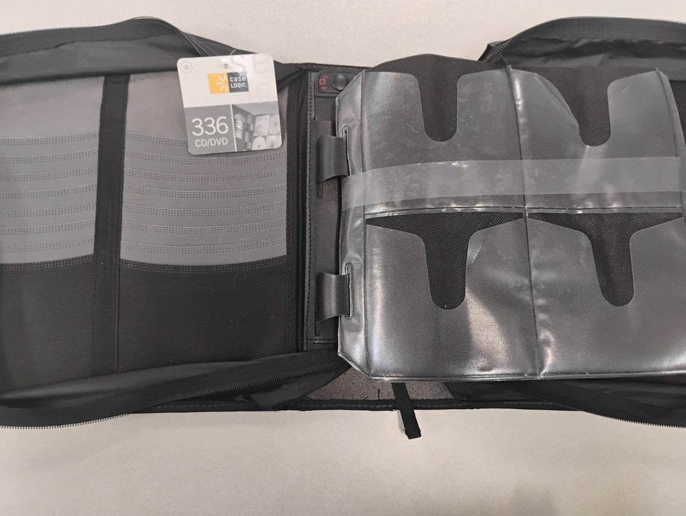 Case Logic 336 CD/DVD Case Black. SMALL TEAR SEE PICTURES