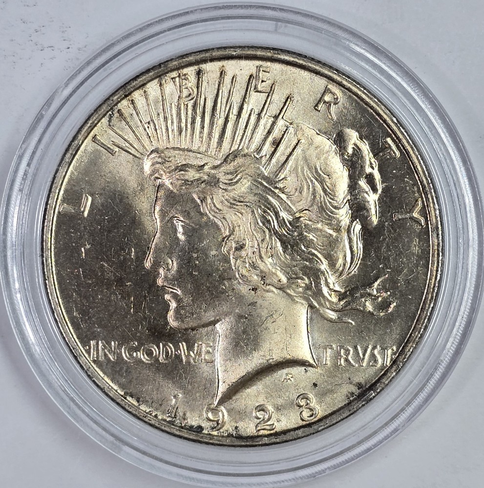Toned 1923 90% Silver Peace Dollar UNC in a Capsule