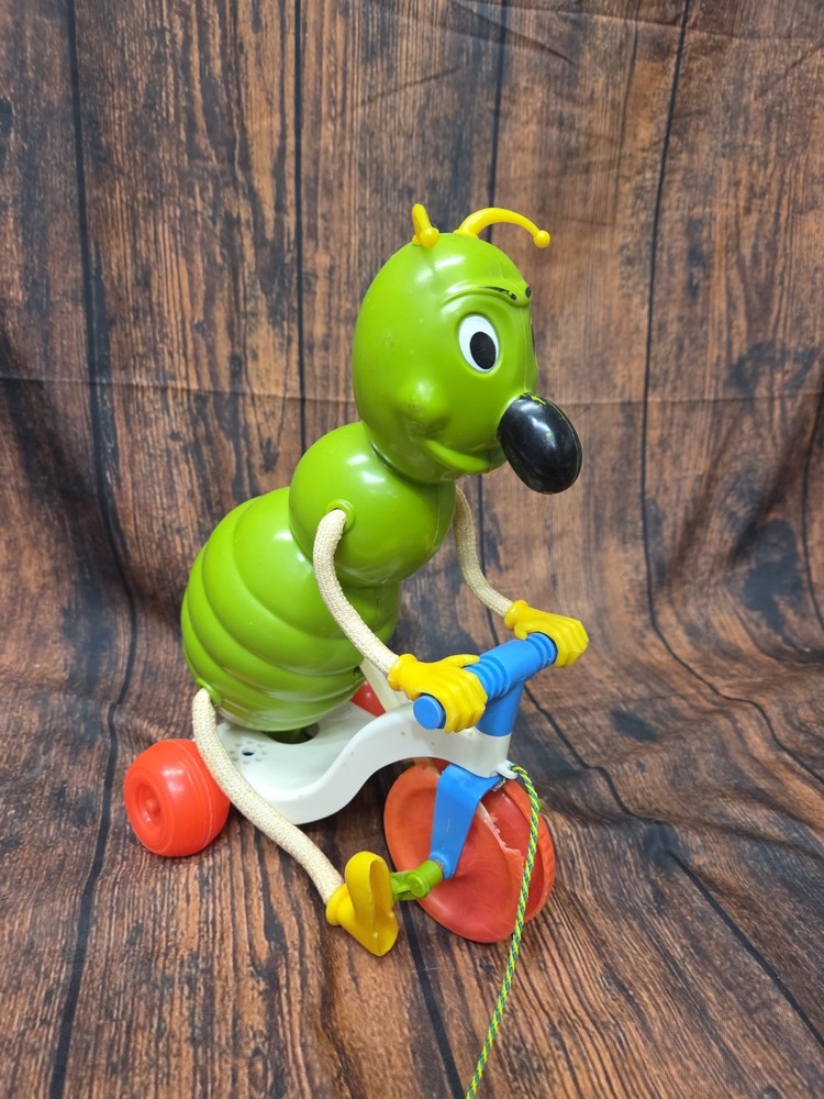 1967 Vintage Kusan “Cyclin' Sam” Bug Pull Toy