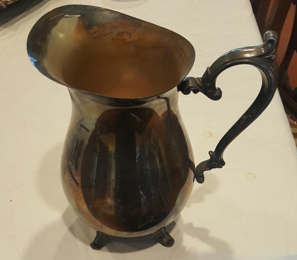 Water Pitcher, 1970s, Silverplate footed with flourish handle