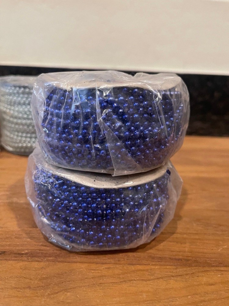 5 rolls of plastic string beads