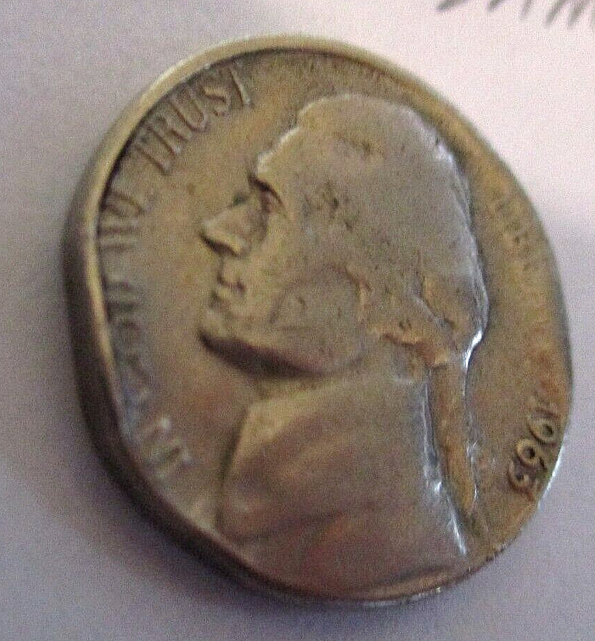 1963 D nickel with die/mint damage, missing letering, m272