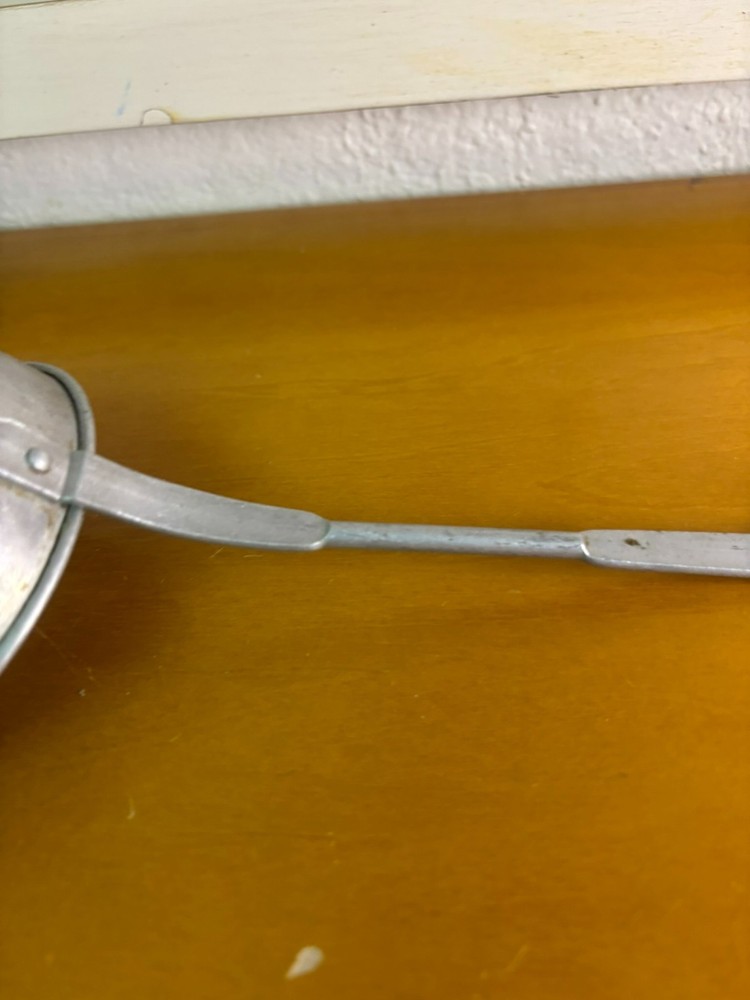 small vintage aluminum strainer