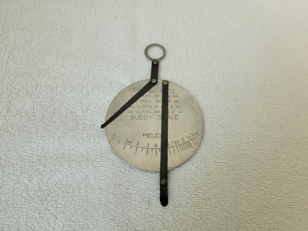 VINTAGE BUDDY MFG. HANDHELD BUDDY SCALE POSTAL SCALE