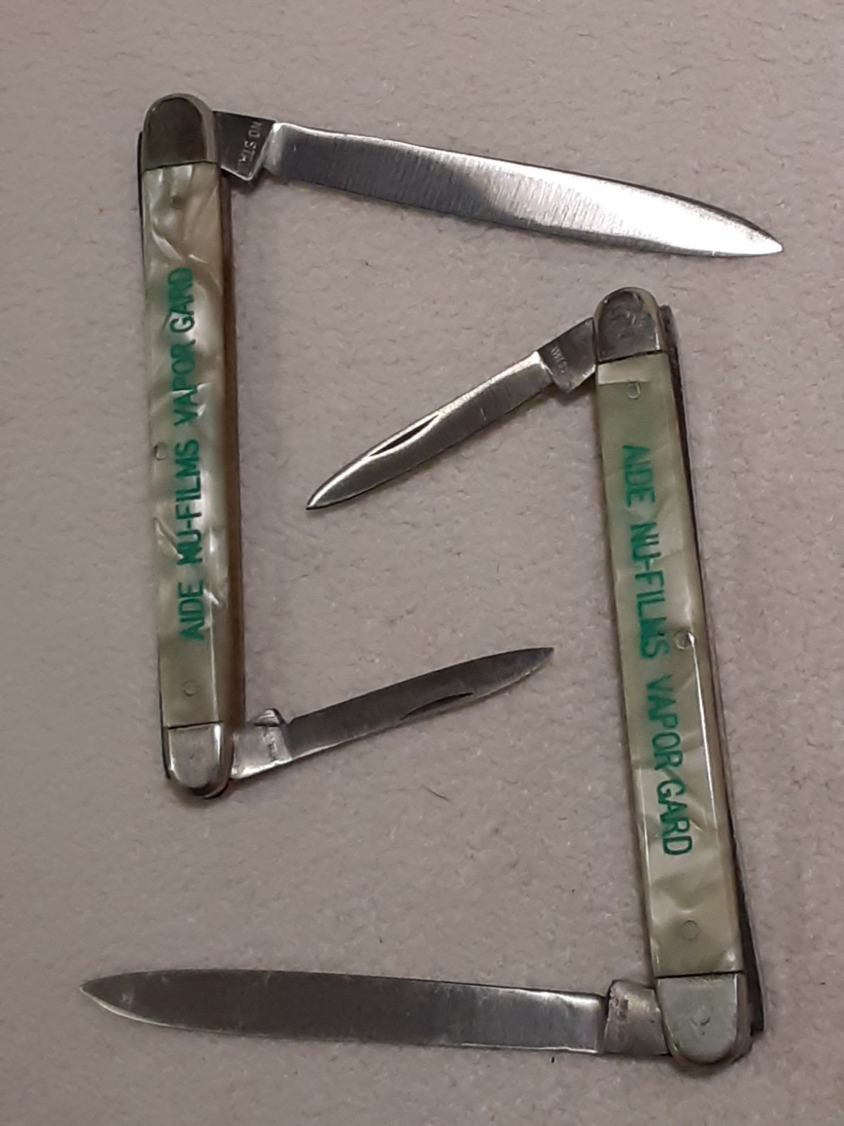 2 MURCOTT GERMANY ADVERTISING POCKET KNIVES MILLER FERTILIZER CO BALTO MD