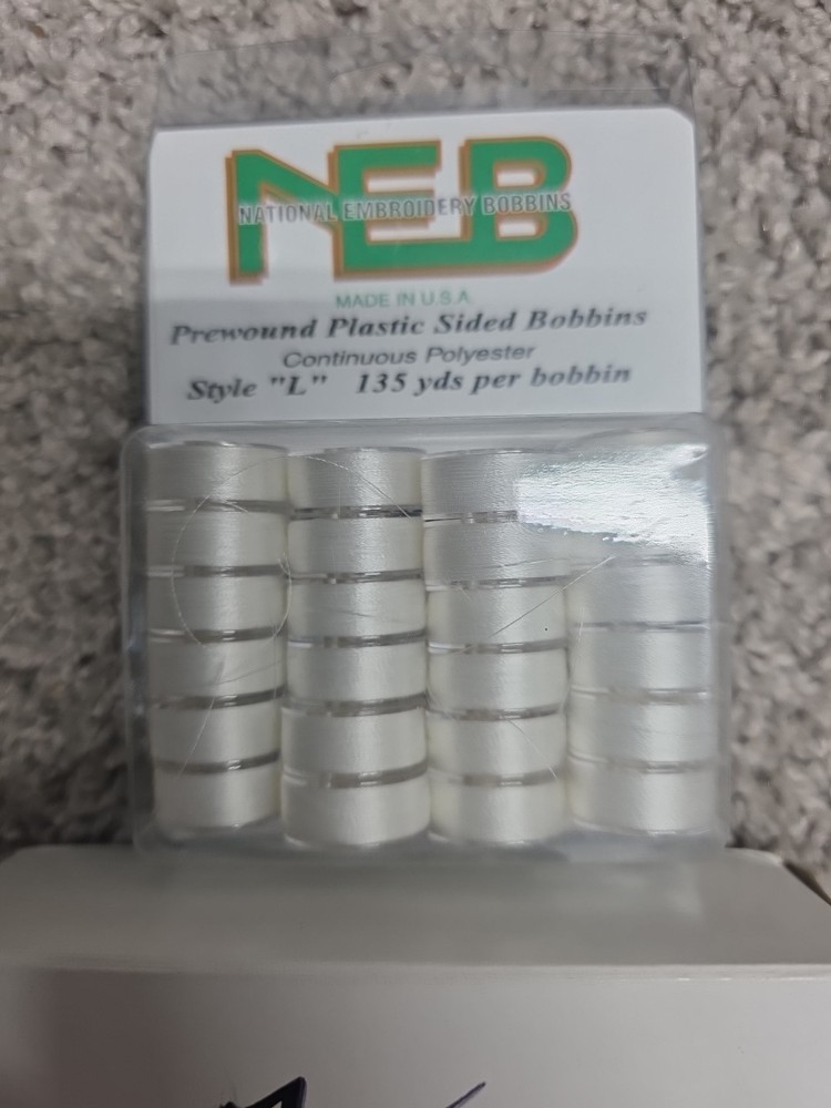 NEB National Embroidery Prewound Bobbins. White Machine Thread