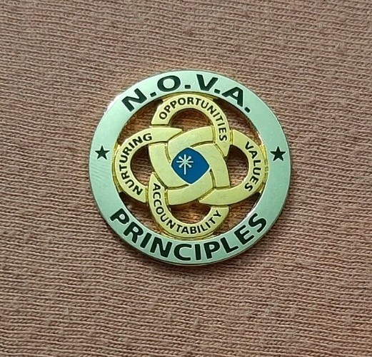 NOVA Principles Foundation Program jacket lapel pin Nurturing Opportunities