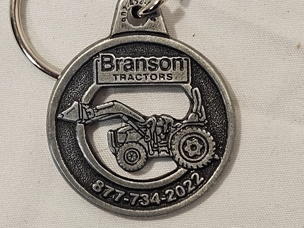 NEW BRANSON TRACTOR CO. 2 SIDED METAL KEYCHAIN FEATURING LOADER TRACTOR