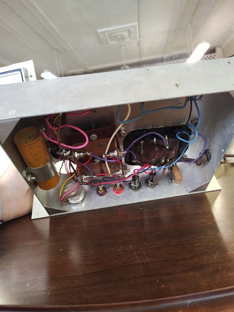 custom-built power supply fixture featuring Simpson Model 59 panel meters.