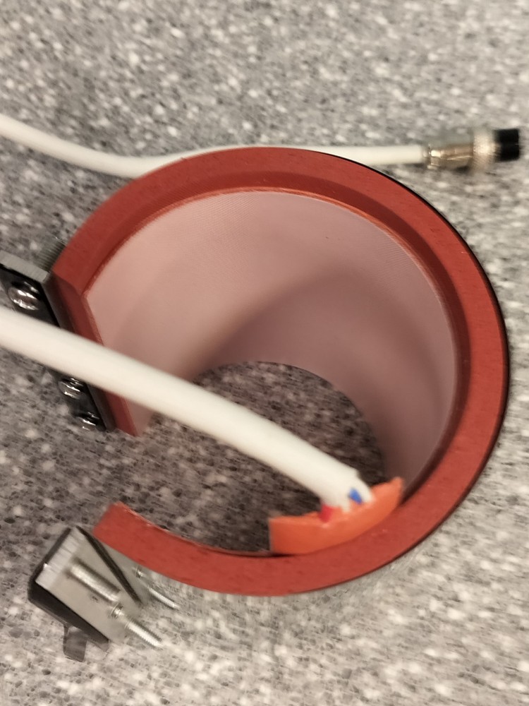 Mug heating element Attached For A Mug Heat Press Machine.