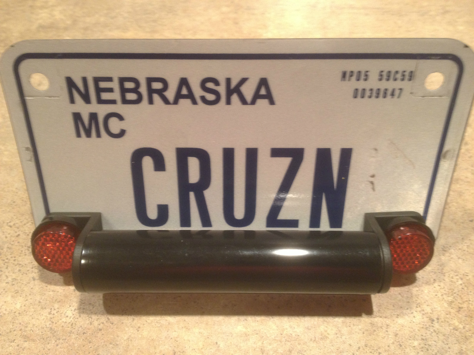 registration holder - stash tube - Harley, Honda, Kawasaki all motorcycles