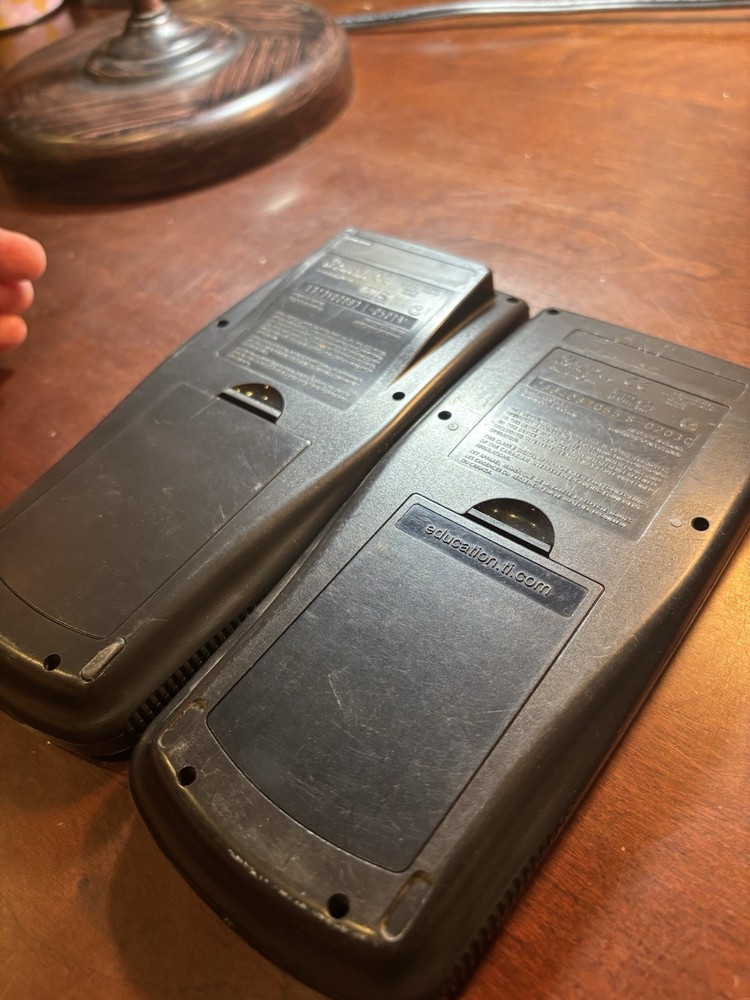 (2) Texas Instruments Ti-83 Plus Graphing Calculators Both Work