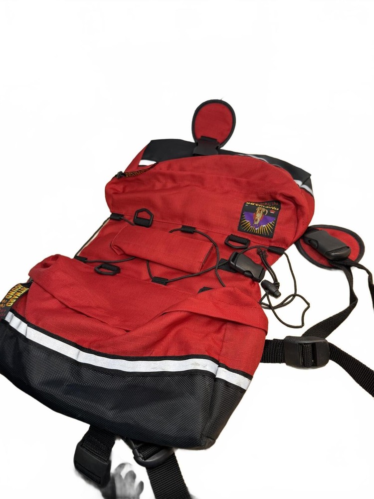 Howard Round Red and Black Dog Backpack