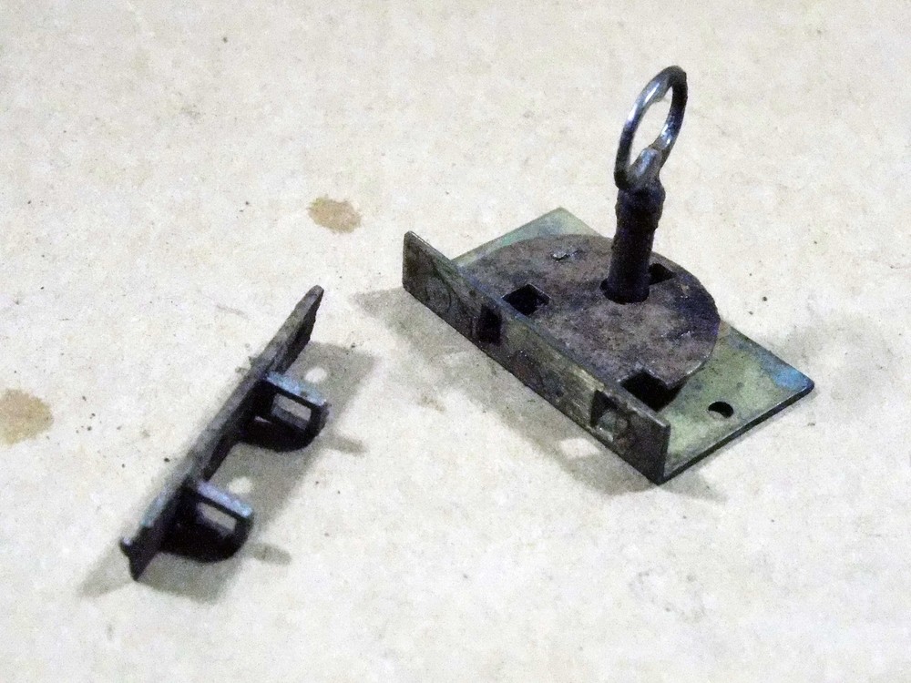 Antique miniature chest lock.