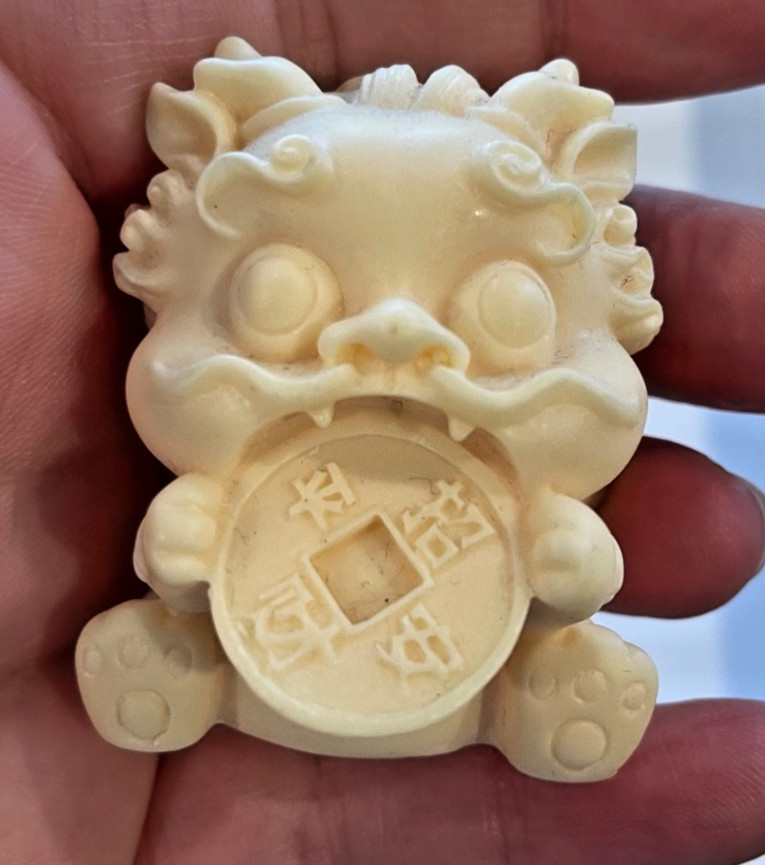 Ivory nut money animal (pair)