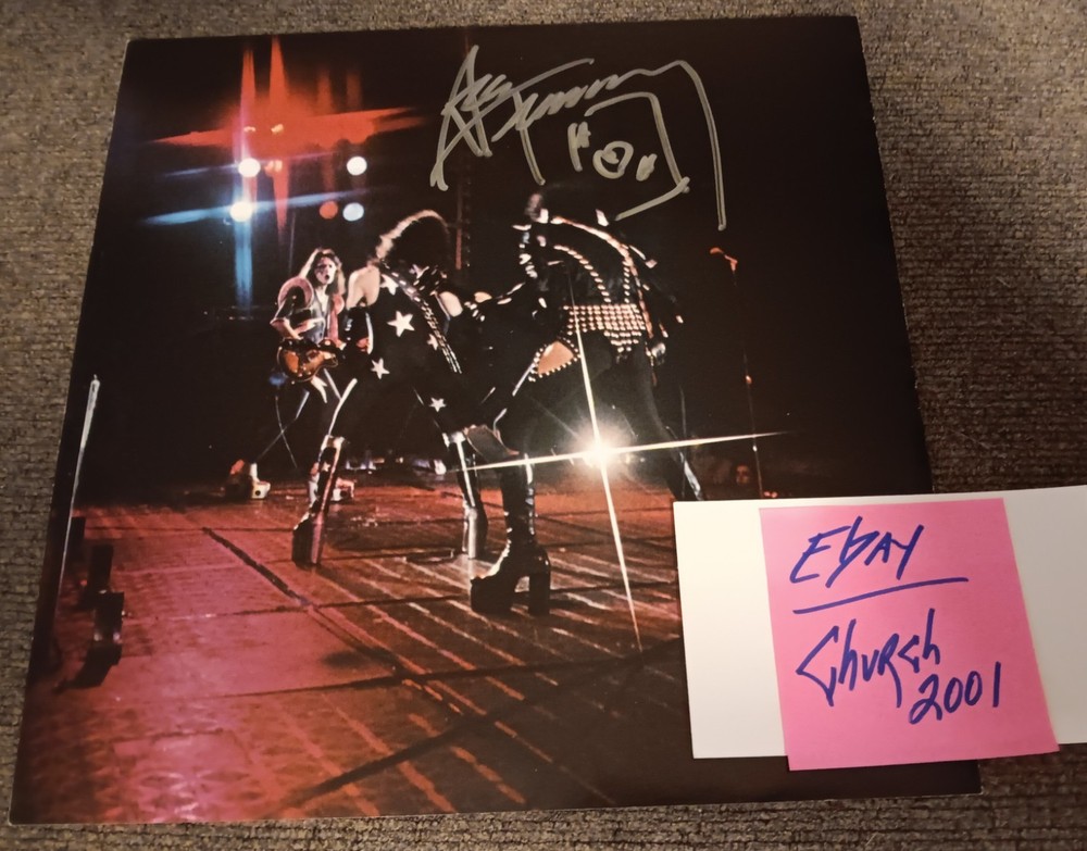 KISS Ace Frehley SIGNED 1976 'On Tour' Tourbook Photo Page Silver Marker #1