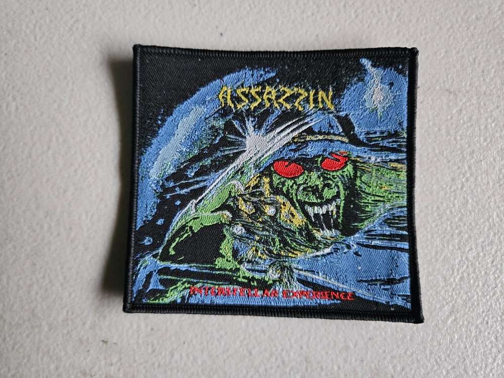 ASSASSIN,INTERSTELLAR EXPERIENCE, SEW ON BLACK BORDER WOVEN PATCH