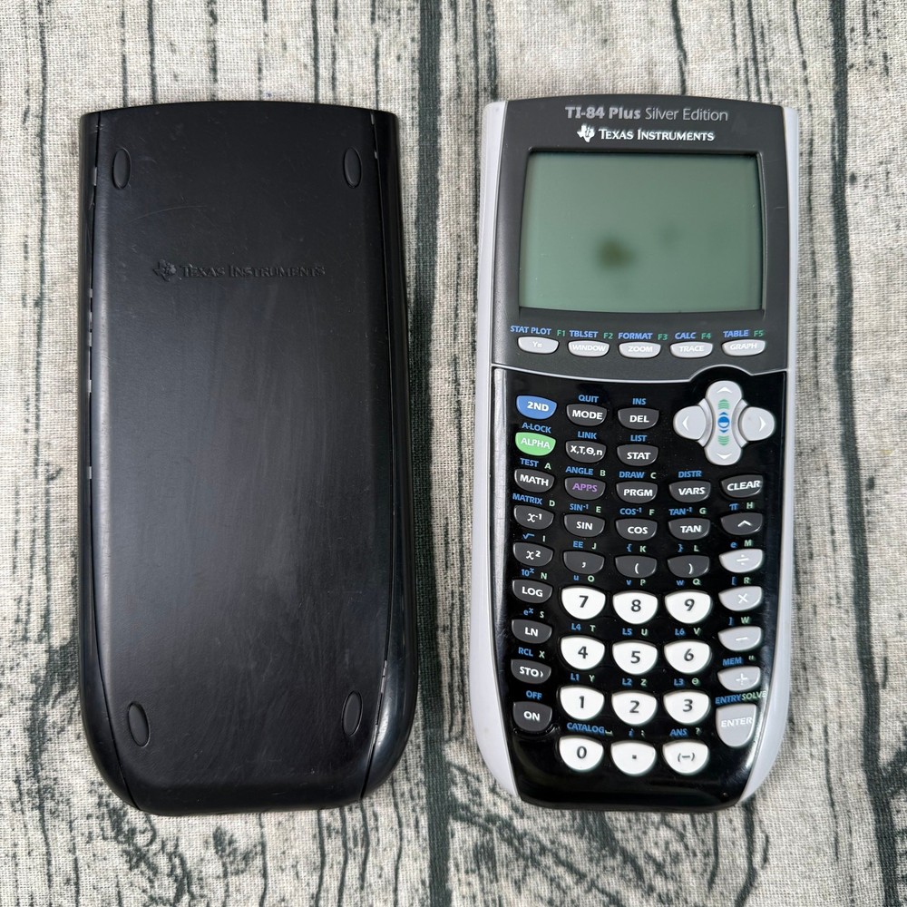 Texas Instruments TI-84 Plus Silver Edition Graphing Calculator - *Read*