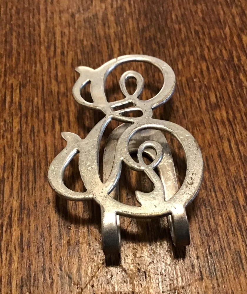 Vintage sterling Apollo initial napkin holder “E”