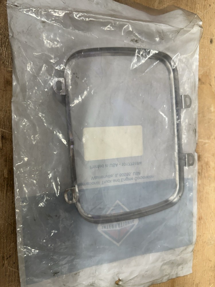 NOS International Chrome Headlight Bezel 1691210C1
