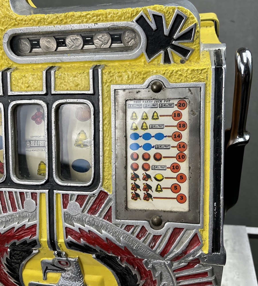 ANTIQUE MILLS WAR EAGLE 5 CENT SLOT MACHINE