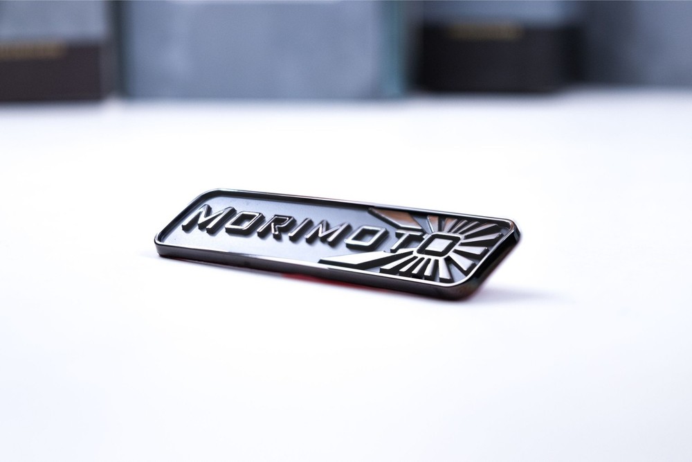 Morimoto Badge: (Black Chrome)