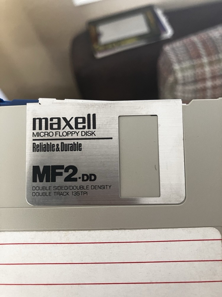 Commodore Amiga random 50 Disk Lot - 3.5" DS/DD. Includes Disk Caddy/Box