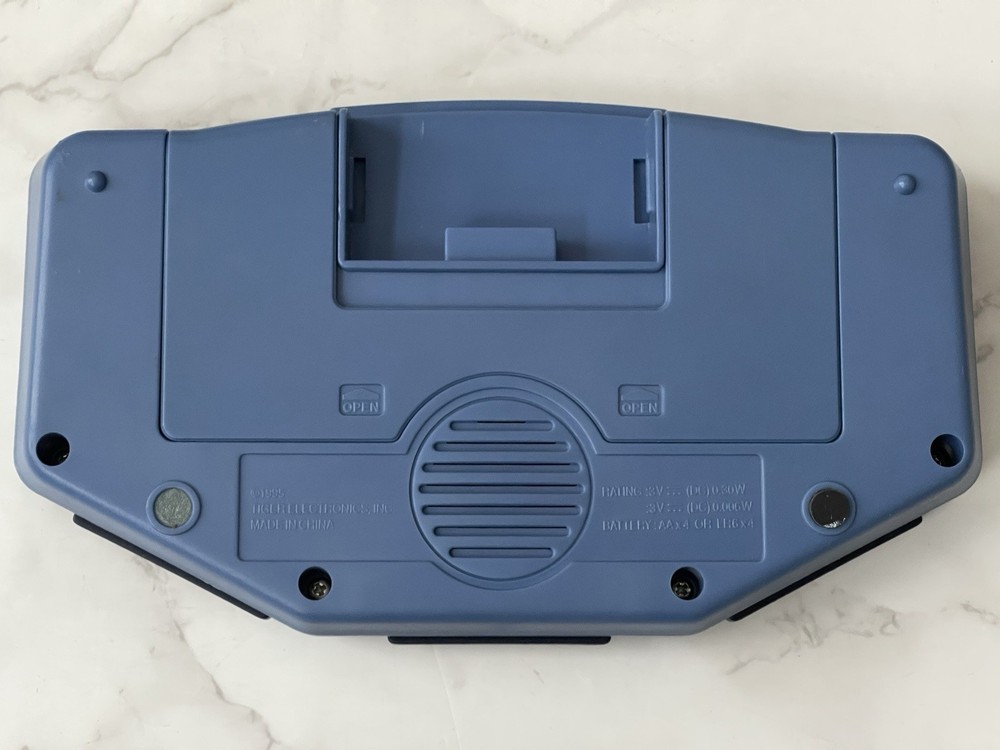 Tiger Electronics Jeopardy Handheld Game w/ 2 Answer & Question Book & Cartridge