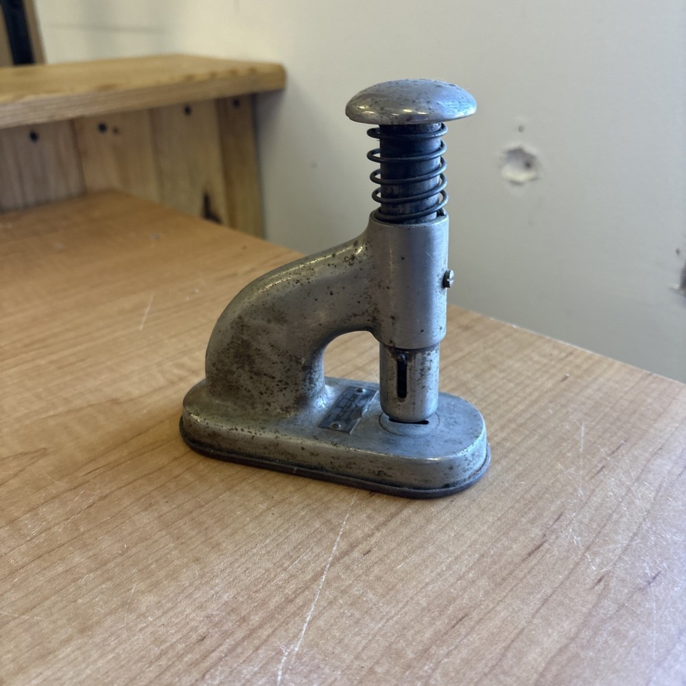 The Clipless Stand Machine - The Clipless Paper Fastener Co. - Newton, Iowa
