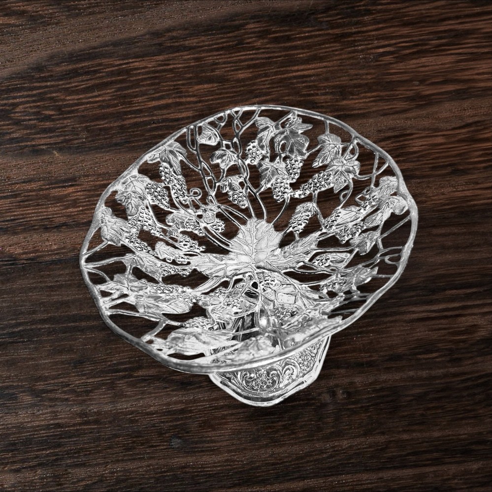 Silver-plated footed centerpiece with intricate grape and vine design