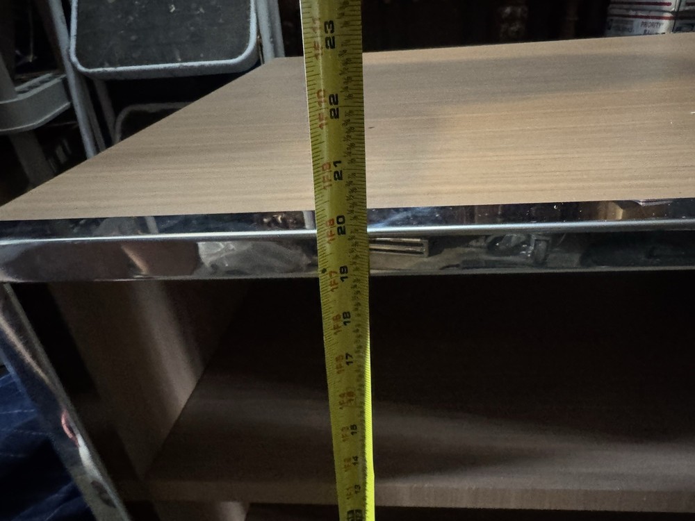 Minimalist side table,consistent with Minotti’s design likely the Hamilton