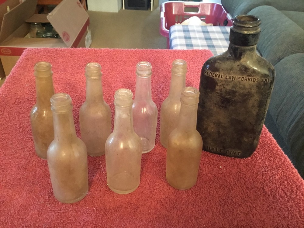 Old Brown 1/2 Pint Bottle and 7 Miniture Bottles