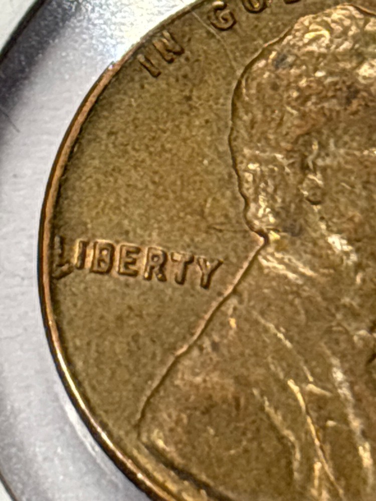 1964 D Lincoln Cent Lamination Die Cud by “L” (BROKEN L ERROR)