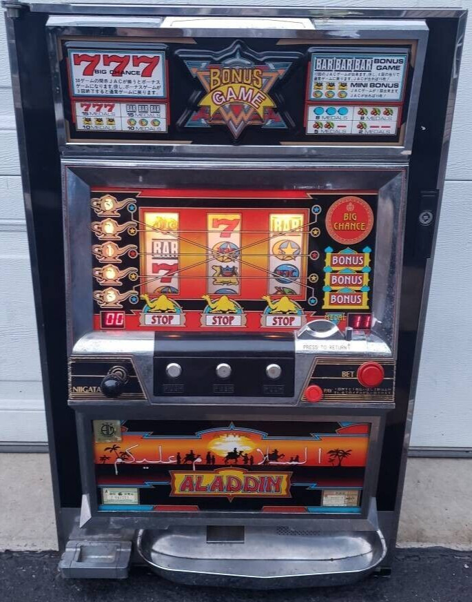 TOKEN SLOT MACHINE ALADDIN 1995