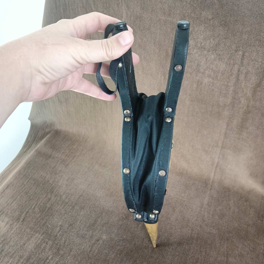 blacksmith's bellows or for lighting a barbecue or decoration