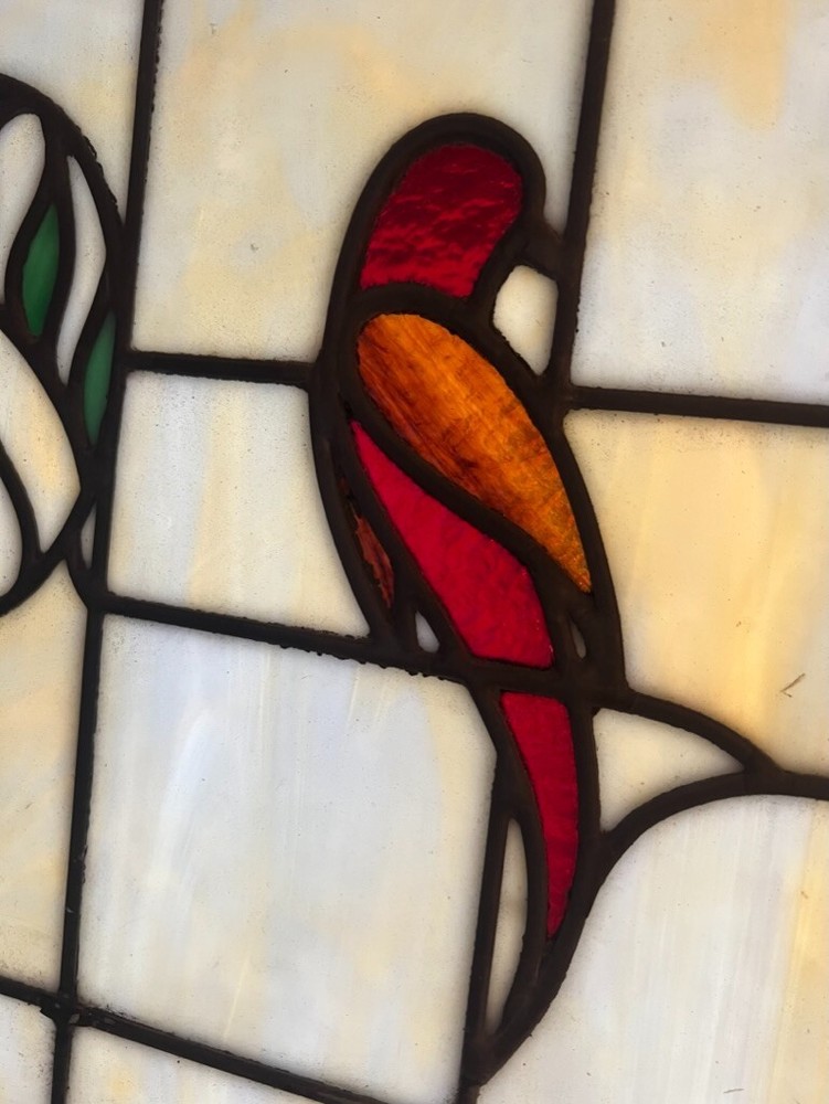 Distelfink stained glass window