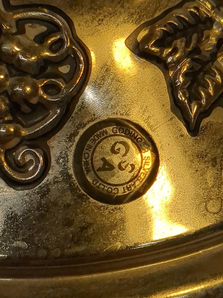 Vintage Godinger Silver Co. 4-tier rotating server with a grape/leaf design.