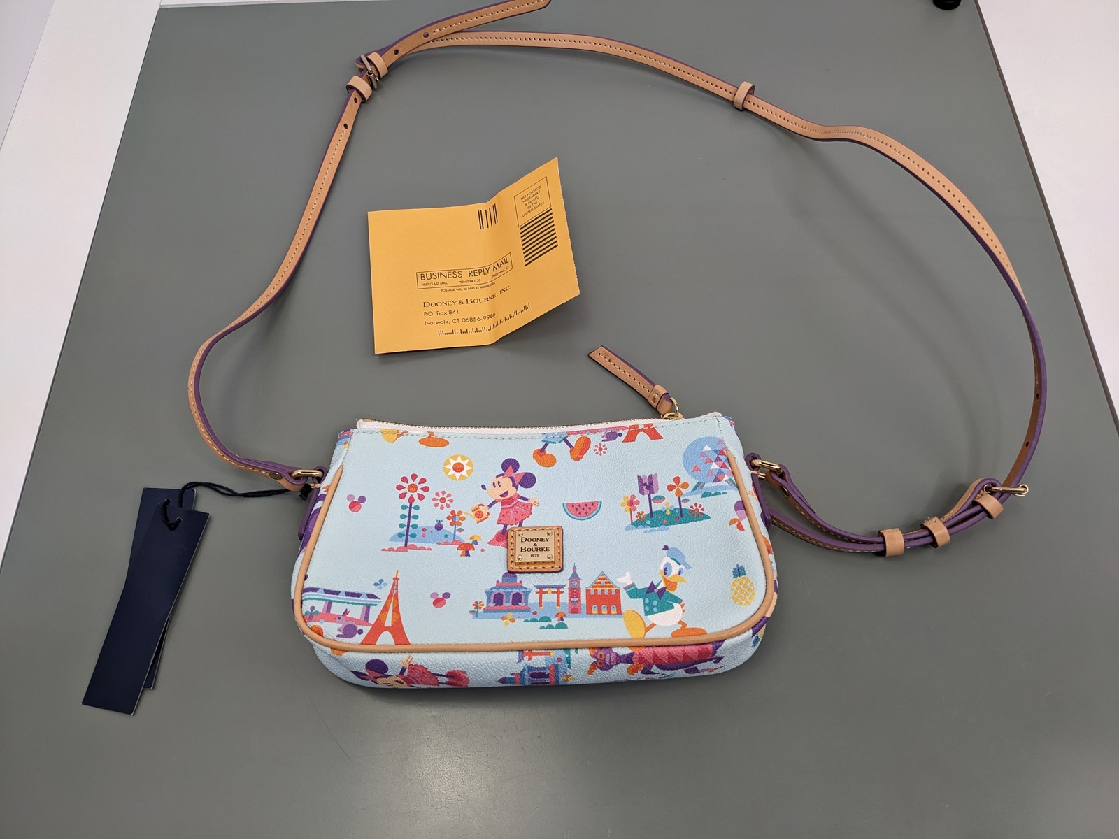 Disney Parks Dooney & Bourke Pouchette Crossbody Bag Epcot Flower Garden Lt Blue