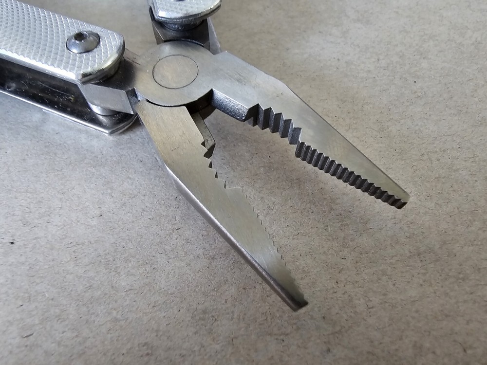 Pocket Multi-Tool with 9 Tools - Pliers Cutters Opener Flat Head Scissors Knife