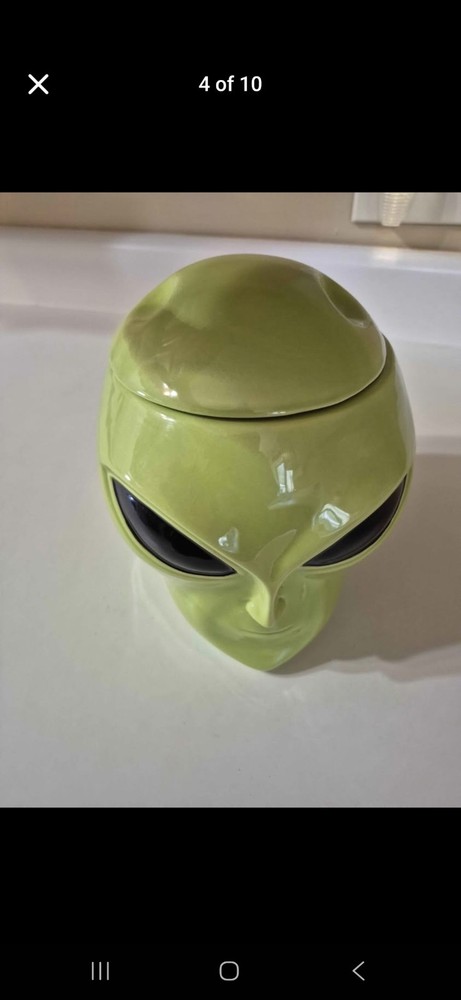 1990s vintage "Alien Pops" lollipop advertising display container.