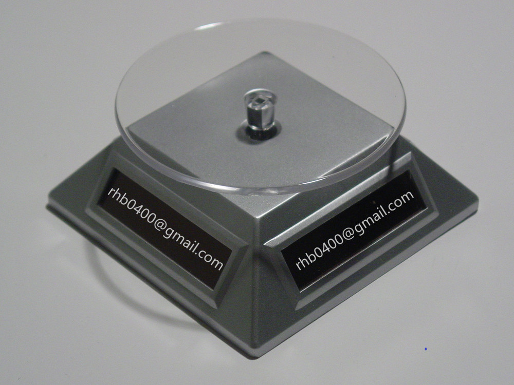 **TWO  FOR  ONE  SALE**     SOLAR  POWERED  ROTATING  DISPLAY  BASE - silver