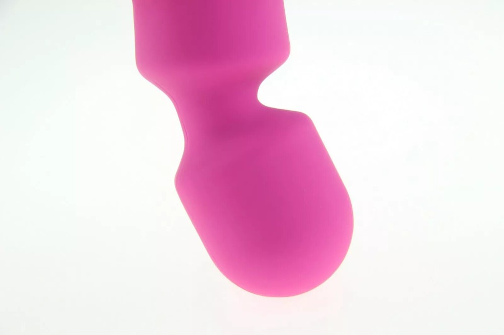 Cordless hand held body massager