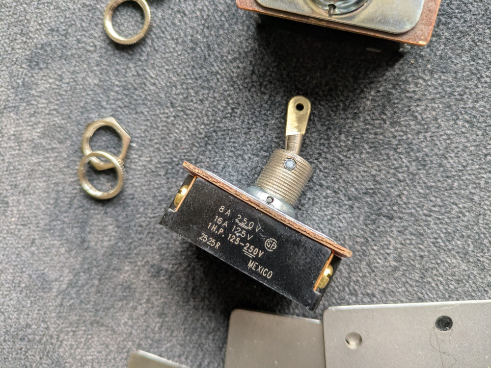 HEAVY DUTY DOUBLE POLE TOGGLE SWITCH - MACHINED WITH A FLAT BLADE HANDLE