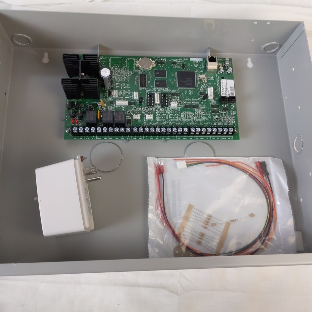 DMP XR150NL-G Network Panel Assembly and Accessories.