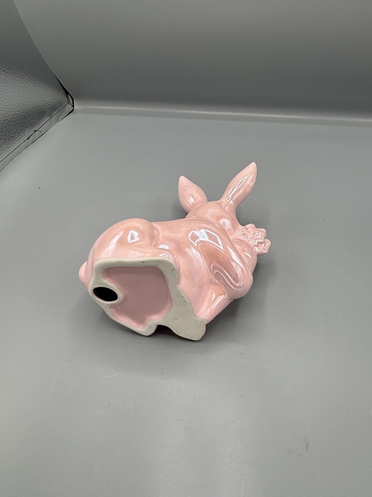 Glossy pink ceramic Easter bunny with carrot